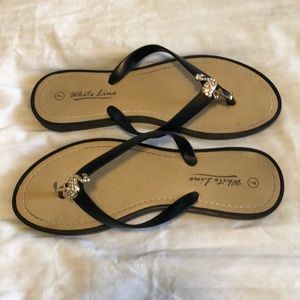 NWOT Gold and Rhinestone Flamingo Black Flip Flops